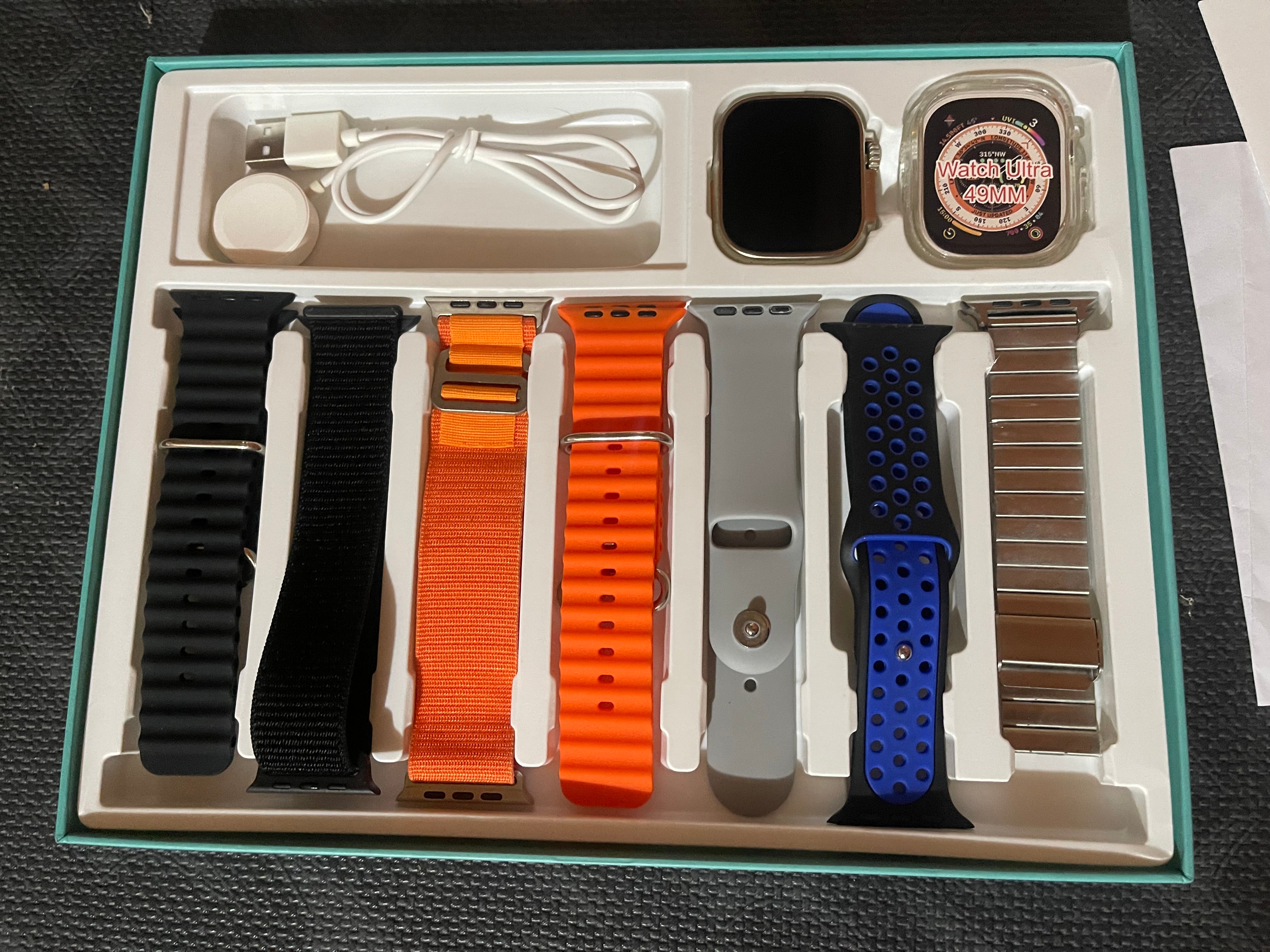 Ultra Y60 Premium Quality 8 in 1 Smartwatch β 7 Variable Straps & Chain & Ocean Strap With Ultra Watch Case & Wireless Charger in just Rs 6499